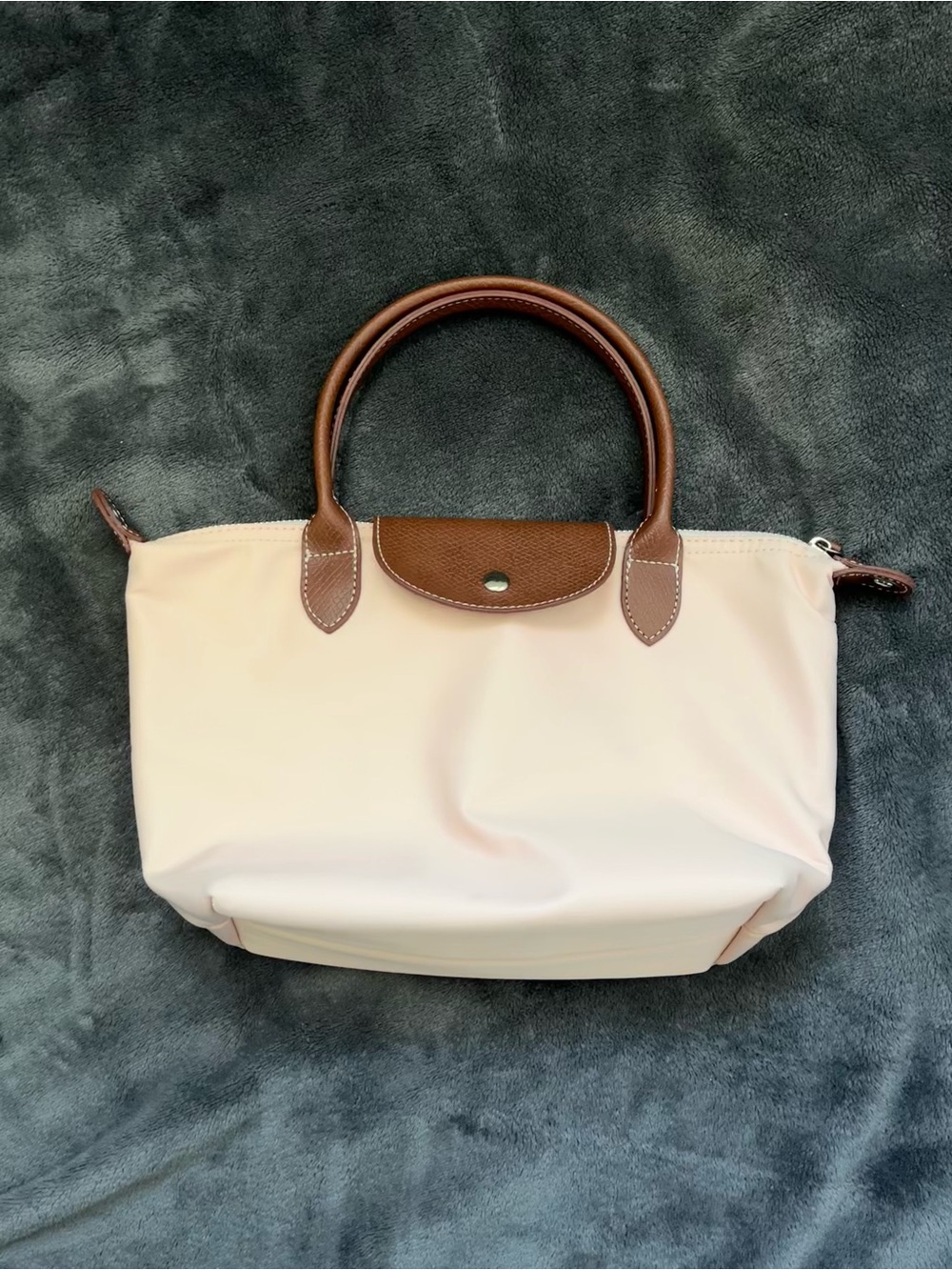 small light pink nylon tote bag